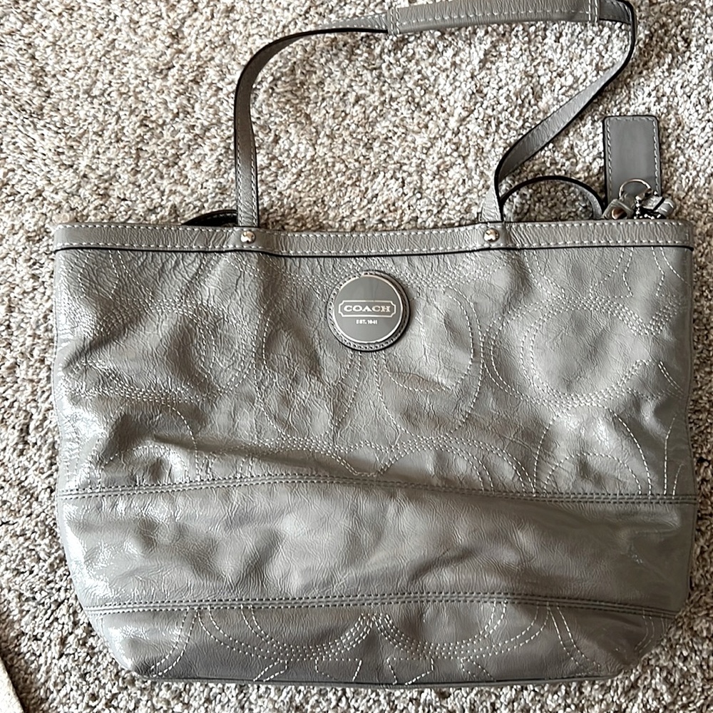 Gray coach tote. Used but still in great condition I bought it at the outlet